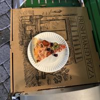 Ate a slice while waiting for the free bus .  at Nick's Pizza South Beach in Miami Beach