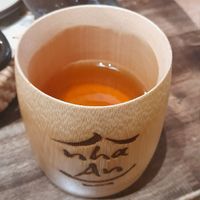 Tea in a bamboo cup at Nhà An Vegetarian in Hanoi