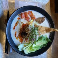 large bowl of creamy soy milk ramen  at Ramen Katamuki in Kyoto