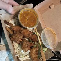 Satay chicken skewers  at WOK2VEGAN in Birmingham