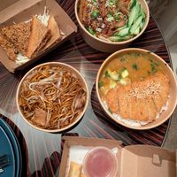 Spring rolls, sesame crunch toast, chicken katsu, crispy duck chow mein and chicken chow mein at WOK2VEGAN in Birmingham