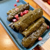 Vegan dolma (grape leaves stuffed with rice). Note: served with tahini sauce that contains sour cream, ask to omit sour cream or bring vegan sauce at The Hive in Yerevan