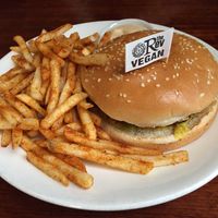 Vegan cheeseburger with fries at The Reverence Hotel in Footscray