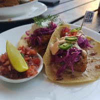 Fish taco and fried pickle taco at The Reverence Hotel in Footscray