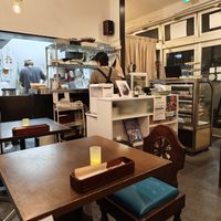 Inside + cashier + open kitchen at LOTUS CAFE TOKYO in Tokyo