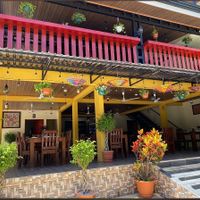Lovely outdoor setting, but covered and with many ceiling fans.    at Tandoor Indian Restaurant Tamarindo in Tamarindo