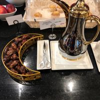 Stuffed dates and Arabic coffee  at DXB - Marhaba Lounge - T1  in Dubai