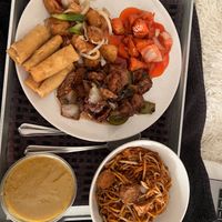 Full plate with curry sauce on side  at Happy Valley in Rochester