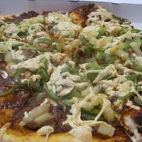 The À la Shannon pizza (mushrooms, garlic, green pepper, and pineapple) is really yummy. I recommend it. at Vegan Rapide - Sherbrooke in Montreal