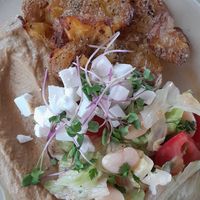 Smashed potatoes,  white bean salad 🥗 😋 at VegÁno in Liptovsky Hradok