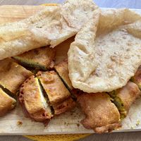 Bread pakora (comes with sauces) and breads   at Namaste Inbhir Nis  in Inverness