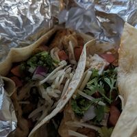 Vegan beef tacos with vegan cheese at Crafted The Art of the Taco in Greensboro