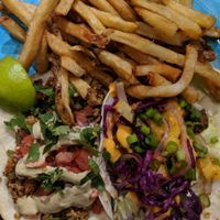 2 tacos (1 chofu and 1 seitan) with a side of fresh cut fries at Crafted The Art of the Taco in Greensboro