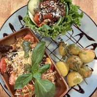 Smoked tofu with new potatoes and salad.  at Vieta in Vilnius