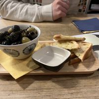 Marinated olives with garlic bread  at Vieta in Vilnius