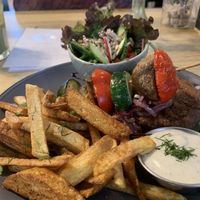 Beyond meat steak with Fries   at Vieta in Vilnius