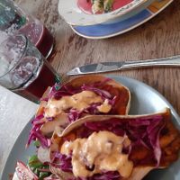 tacos and mashed potatoes in the background at Vieta in Vilnius
