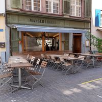 Outdoor seating at Manger Boire in Basel