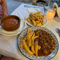 Moussaka, Mushroom Stifado and hand cut chips.  Absolutely Delicious.  Will definitely eat here again. Great hot vegan food !! at Ta Kaloudia in Corfu