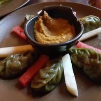 Pesto mo-mos, nice spice level.  at Places Restaurant and Bar in Kathmandu