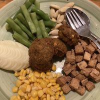 Healthy plate: lots of ingredients to compose your meal, I choose falafel, mashed potatoes, tofu, green beans, sweet corn, almonds   at Places Restaurant and Bar in Kathmandu