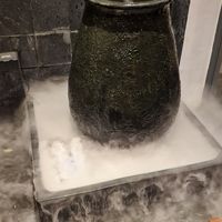 Liquid ice spouting urn outside the restaurant,  weird but cool! at Om Eatery in Ho Chi Minh City