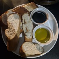 Warm bread basket with balsamic & oil at Smoke  in Wilmslow