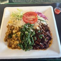 Vegan mix with tofu, tempeh and white rice   at Foodhall Scheveningen in The Hague