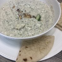 Maast-o-Khiyar - Persian cucumber, yogurt, and spice dip, served with hot pita bread.  at Neek Vegan in Duluth