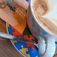 Oat cappucino with vegan choco beans at Bagels & Beans - Kruisstraat in Haarlem