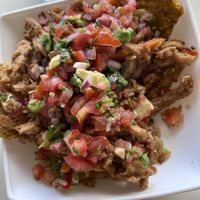 Soyfrijo their version of chifrijo. Rice, beans, pico de gallo and “chicharrón.“  at Arbol de Seda in San Jose