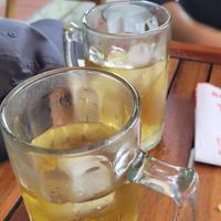 Free ice tea served by the friendly owner while we talked and waited for the sandwiches to be made at Bánh Mỳ Chay Tâm Trí in Da Nang