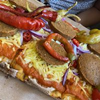 Mit Veganer Tofu Wurst...  at Sicily Cafe in Prague