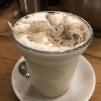 Vegan soy drink with date syrup and halva shavings at Aroma - Hillel St in Jerusalem