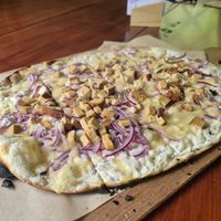 Flammkuchen mit Räuchertofu und Käse at Lebenshof MutimBauch in Ottenhoefen Im Schwarzwald