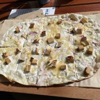 Flammkuchen with tofu, onions and cheese  at Lebenshof MutimBauch in Ottenhoefen Im Schwarzwald