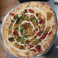Build your own vegan pizza: garlic & olive oil, cheese, mac n cheese, meatballs, broccoli, red peppers, ranch sauce!  at Flying Saucer Pizza Company in Salem