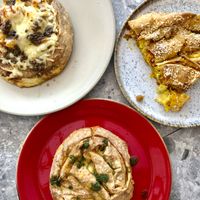 💫 THE BEST VEGAN BANITZA EVER 💫cashew cream cheese. zucchini. sun dried tomatoes. chickpeas. rosemary. sesame. olive oil.   at Lubanitza - ЛЮБА̀НИЦА in Bansko