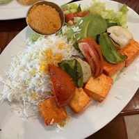tofu kabob with basmati rice, avocado salad, and spicy hummus  at Panini Kabob Grill in San Diego