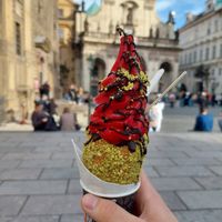 Pistachio Trdelník wit Strawberrys, Rasberry Ice Cream and dark Chocolate at Little Chimney Gelato & Bakery in Prague
