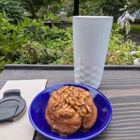 Sticky bun and chai in my own container at Our Spot in Portland