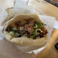 Falafel sandwich with added toppings from the falafel bar— so tasty! I recommend adding the local habanero hot sauce.    at Falafel Bar in Manuel Antonio