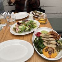 Front to back: Morning Meze w potatoes instead of egg, Spring Lettuces, and Marinated Heirloom Bean Toast. Everything was delicious!  at Botanica Restaurant & Market in Los Angeles