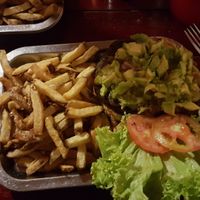 Crazy portion size. The burger is open here  at Brunch de Salento in Salento