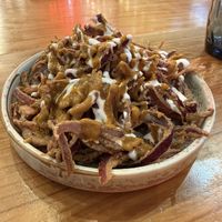 Flores de cebolla con mostaza y mayonesa vegana  at Bacoa Burger Gavarres in Tarragona