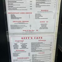 Wall menu; vegan items have leaf next to name. at Effy's Cafe in New York City