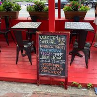 Placard, outside seating at Effy's Cafe in New York City
