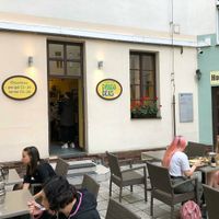 The seating outside, my daughters are enjoying their dishes( the two, one with pink hair, you can't miss her :)) at Dhaba Beas - Tynska in Prague