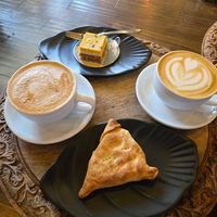 Soy milk on the left (he is still trying to perfect the heart) and oat milk on the left.  at Mohka House in Oakland