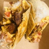 Breakfast burrito w/ just egg, sausage that seemed more like soy chorizo, and vegan provolone.!  at Bearcat Baked in New Orleans